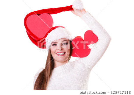 Happy girl in santa hat heart shaped box Happy girl in santa hat heart shaped box 128717118