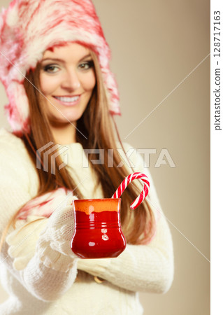 Woman with christmas sweets Woman with christmas sweets 128717163