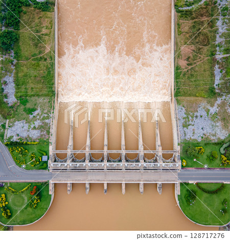 Aerial top view of Pasak Chonlasit Dam, a hydroelectric dam located in Lopburi, Thailand. Aerial top view of Pasak Chonlasit Dam, a hydroelectric dam located in Lopburi, Thailand. 128717276