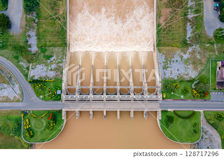 Aerial top view of Pasak Chonlasit Dam, a hydroelectric dam located in Lopburi, Thailand. Aerial top view of Pasak Chonlasit Dam, a hydroelectric dam located in Lopburi, Thailand. 128717296