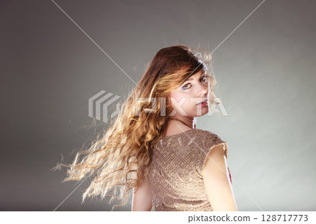 Mysterious enigmatic attractive woman girl. Mysterious enigmatic attractive woman girl. 128717773