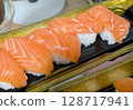 Delicious fatty salmon nigiri sushi - takeaway 128717941