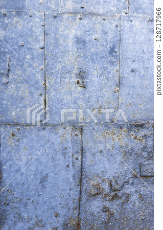 Rusty metal plates forming an old door in Banska Bystrica, Slovakia 128717966