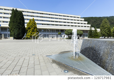 Fountain splashing in front of Hotel Pax in Trencianske Teplice, Slovakia Fountain splashing in front of Hotel Pax in Trencianske Teplice, Slovakia 128717981