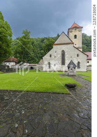 Cerveny Klastor monastery with green lawn and stone pavement in Slovakia Cerveny Klastor monastery with green lawn and stone pavement in Slovakia 128718004