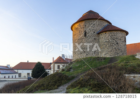 Rotunda of saint catherine illuminating the city of znojmo at sunset in czech republic Rotunda of saint catherine illuminating the city of znojmo at sunset in czech republic 128718015