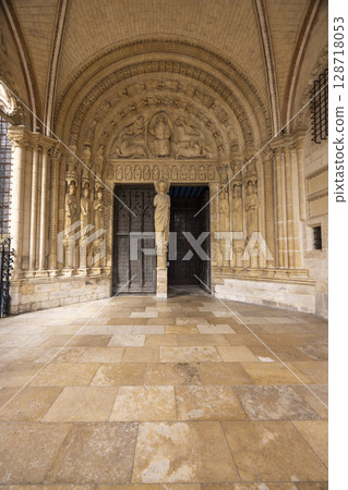 North Portal of Bourges Cathedral showing intricate carvings and statues in Bourges, France 128718053