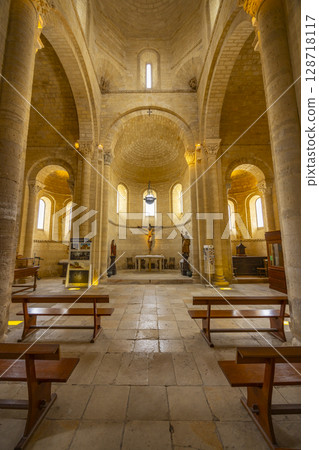 Interior of San Martin Church showing altar, benches and romanesque architecture in Fromista, Spain 128718117