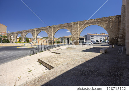 Los Arcos Aqueduct spanning Carretera de Alcaniz in Teruel, Spain Los Arcos Aqueduct spanning Carretera de Alcaniz in Teruel, Spain 128718122
