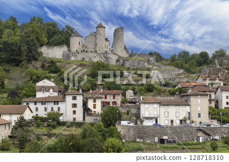 Medieval Castle Overlooking Laroquebrou Village in France 128718310