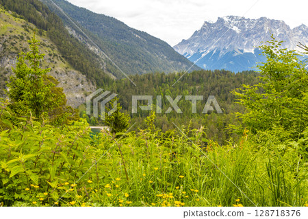 Panoramic view Zugspitze mountain alpine landscape in Alps Tyrol Austria. Panoramic view Zugspitze mountain alpine landscape in Alps Tyrol Austria. 128718376