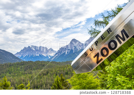 Binoculars at Zugspitze mountain alpine landscape in Alps Tyrol Austria. 128718388