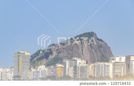 Copacabana Beach Tropical Paradise and City Skyline Rio de Janeiro Brazil. 128718432