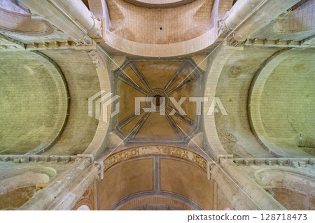 Cupola and arches forming the ceiling of the Church of Notre Dame la Grande in Poitiers, France 128718473