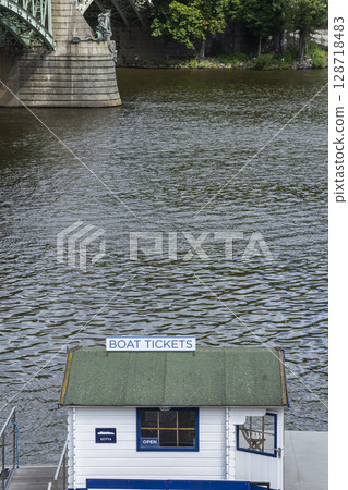 Boat Ticket Booth by the Vltava River in Prague Boat Ticket Booth by the Vltava River in Prague 128718483