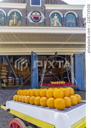 Traditional Dutch cheese market showing Edam cheese wheels in Edam, Netherlands 128718508