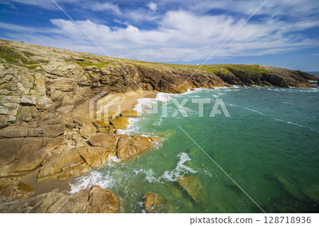 Turquoise water washing Quiberon wild coast in Brittany, France Turquoise water washing Quiberon wild coast in Brittany, France 128718936