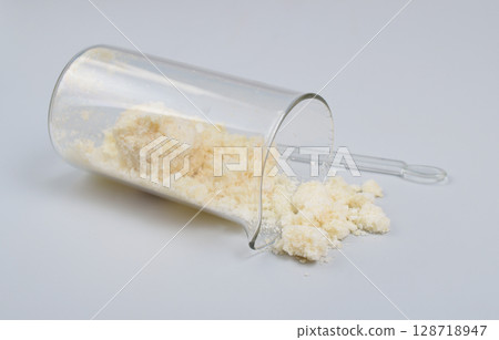 Sodium Oleate powder on light grey background. 128718947