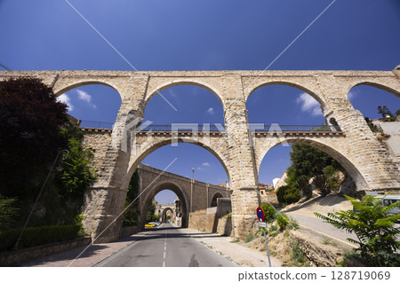 Viaduct of Teruel crossing over the road in Aragon, Spain 128719069