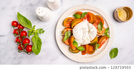 Caprese salad with burrata cheese Caprese salad with burrata cheese 128719503