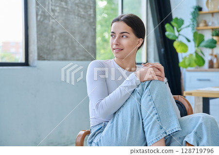 Portrait of beautiful stylish young teenage girl posing at home 128719796