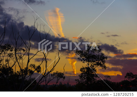 A vibrant orange Thunderhead Cloud at sunset in the Blue Mountains A vibrant orange Thunderhead Cloud at sunset in the Blue Mountains 128720255
