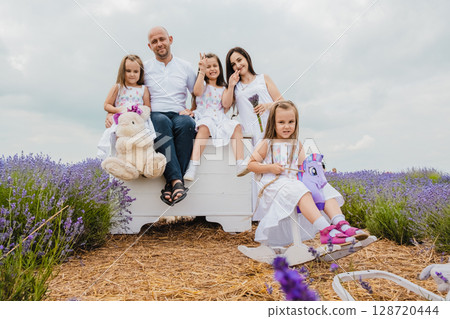 The family enjoys a beautiful day in the lavender field 128720444