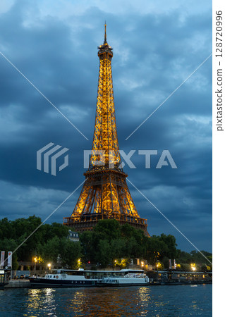 Eiffel Tower Illuminated at Night in Paris, France 128720996