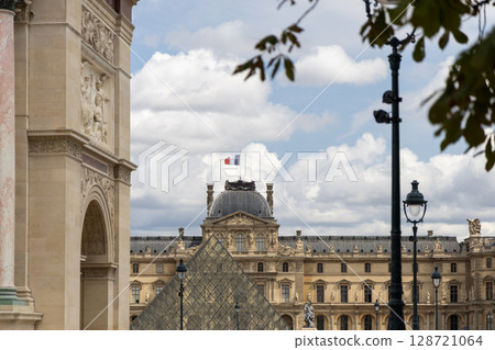 Scenic View of the Louvre Museum and Glass Pyramids in Paris, France 128721064