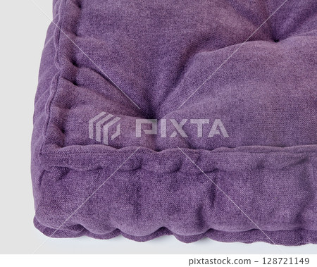 Close-up of purple velvet cushion showing stitching detail Close-up of purple velvet cushion showing stitching detail 128721149