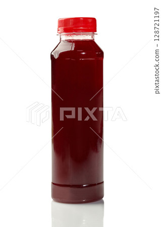 Plastic bottle containing red cherry juice on white background Plastic bottle containing red cherry juice on white background 128721197