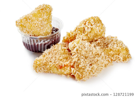 Breaded fried camembert cheese wedges with cranberry sauce dipping 128721199