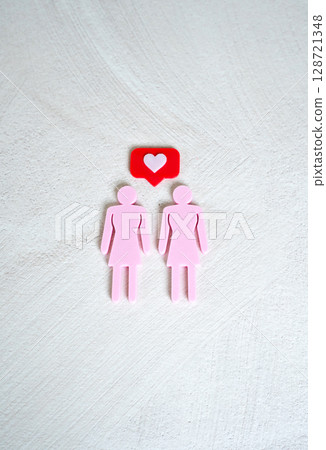 Two figures of women with a heart above them. Lesbian couple. Same-sex relationships, LGBTQ. Romantic connection, equal rights, modern love, and inclusive values in society and media. 128721348