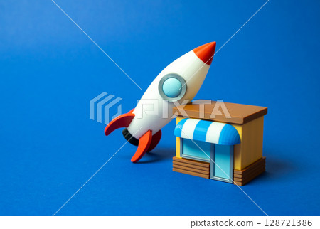 Shop and rocket. Advertising and marketing concept. Online-to-offline integration, and viral marketing ideas. 128721386