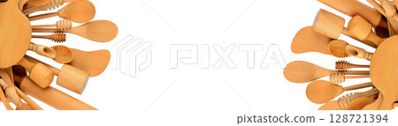 Set of wooden kitchen utensils isolated on white background. 128721394