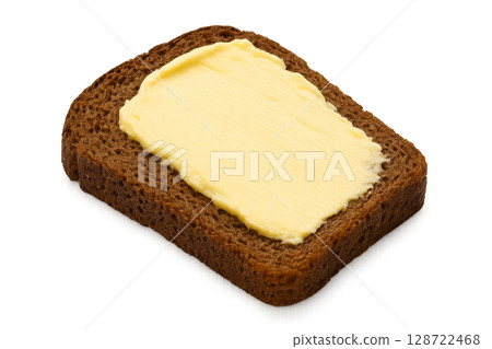 Sliced Brown Bread With a Generous Layer of Butter on Top Ready to Be Enjoyed During a Breakfast 128722468