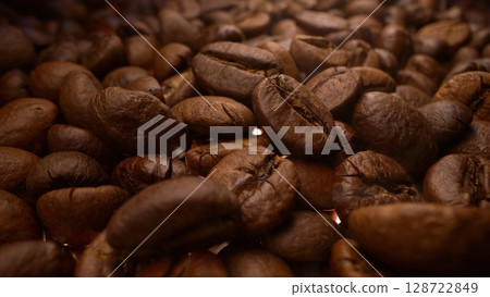Aromatic Rich Coffee Beans Roasting. Caffeine Energy. Brazilian Arabica Harvest  128722849