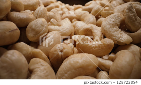 Macro Of Raw Cashew Nuts, Detailed Close-Up With Natural Textures, Nutty Kernels 128722854