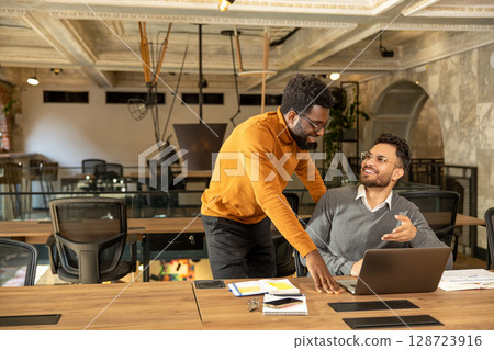 Colleagues working in the office and looking busy 128723916