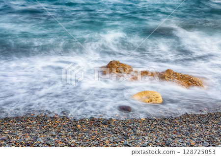 Seascape during sunset. Beautiful natural seascape at long exposure. 128725053