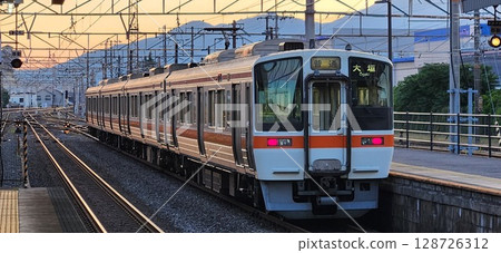 311 series train being pulled into the garage 128726312