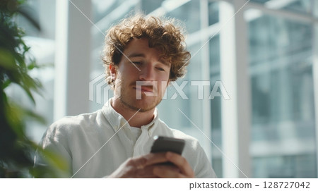 Businessman making a video call in the office 5 128727042