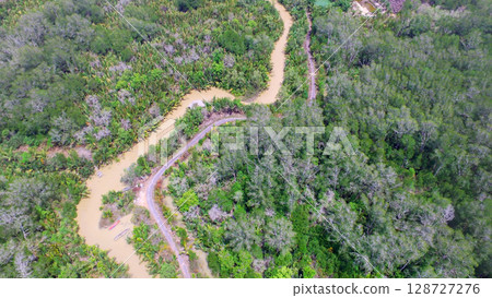 Aerial View of Winding River and Lush Mangrove Forest in Tropical Landscape Aerial View of Winding River and Lush Mangrove Forest in Tropical Landscape 128727276