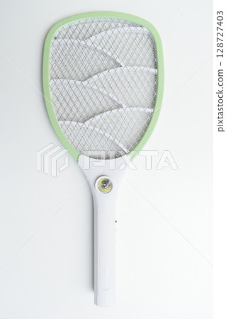 green mosquito swatter isolated on white background 128727403