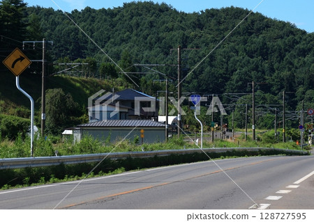 Road scenery of "Ashidanai, Iwate-machi" on National Route 4: Iwate Prefecture 128727595