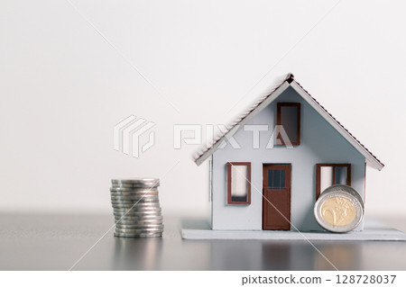 Business home concept involves strategic financial management money coin save bank real estate economic loan investment development growth encourage accountancy buy income stack investment economy 128728037