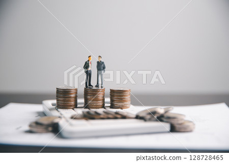 Financial calculate accountant blur background close up on calculator with graph chart banner bank office desk. Finance Concept tax banking money expense accounting budget businessman use calculator. 128728465