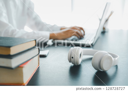 Education concept, learning and teaching with technology, e learning, teaching skills, digital online knowledge, cyberspace global, blur background banner white. hand playing laptop on desk indoor. 128728727