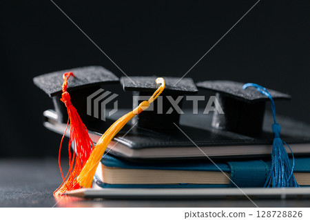Concept education is business scholarship essential idea globalization, mortarboard students learn and study in universities and colleges master knowledge save involves financial management diploma 128728826