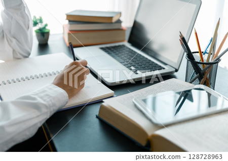 Education concept, learning and teaching with technology, e learning, teaching skills, digital online knowledge, cyberspace global, blur background banner white. hand playing laptop on desk indoor. Education concept, learning and teaching with technology, e learning, teaching skills, digital online knowledge, cyberspace global, blur background banner white. hand playing laptop on desk indoor. 128728963
